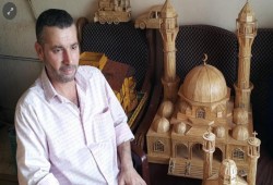 فنان سوري نازح يجسد ألم الحرب والحنين للوطن