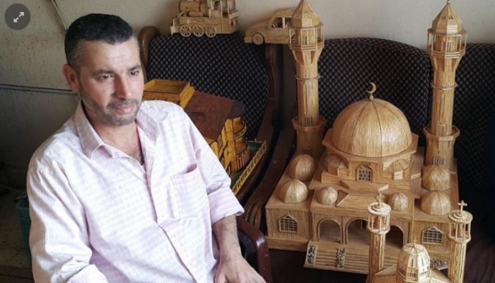 فنان سوري نازح يجسد ألم الحرب والحنين للوطن