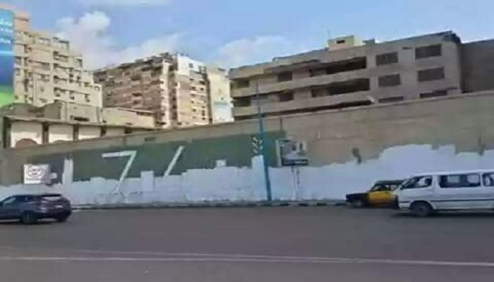 الإسكندرية تطمس أكبر جرافيتي لتأبين شهداء بورسعيد