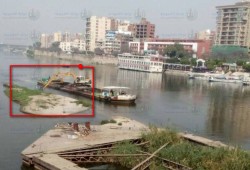 إنخفاض منسوب النيل بـ “بنها” و ظهور جزر رملية ومحاولات لإخفائها
