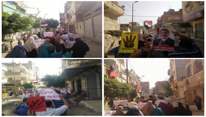 في مسيرة حاشدة ثوار الاسكندرية يرفعون صور الرئيس مرسي وشعارات رابعة ويرددن هتافات التضامن مع سوريا