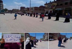 بنات الثورة بالاسكندرية ينظموا سلسلة بشرية رفضا للانقلاب