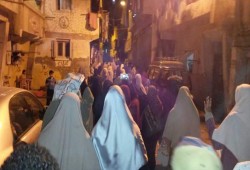 مسيرة ليلية بالرمل بالإسكندرية تنديدا بالانقلاب