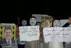 وقفة ليلية لثوار بئر العبد تنديدا بالانقلاب العسكري