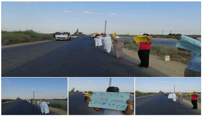 سلسلة بشرية لثوار النوبارية بالبحيرة ترفع شعار "الثورة تحمعنا"