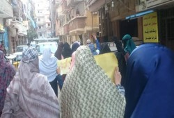 مسيرة لحرائر العصافرة في ذكرى مذبحة رابعة