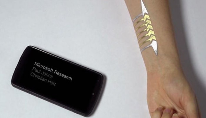 اختراع وشم يتحكم بالهاتف الذكي ويشارك البيانات