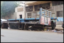 أهالى القباري بالإسكندرية يعانون من مخلفات ورش النقل الثقيل