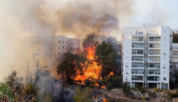 إجلاء 60 ألف شخص من حيفا واجتماع عاجل للمجلس الأمني بسبب حرائق الكيان الصهيونى