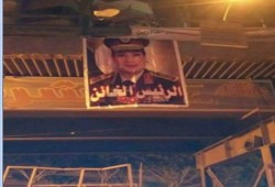 لافتات يناير يجمعنا والسيسى خائن تعلوا كبرى عين شمس