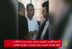 تجديد حبس الصحفي محمود حسين.. والجزيرة تعرض أول صور له بالمعتقل
