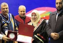 زوجة فقها تطالب أهالي الضفة وغزة بالرد على اغتياله