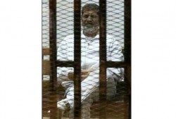 وقف مؤقت للمحاكمة الهزلية للرئيس مرسى و25 آخرين فى "اقتحام السجون" الملفقة