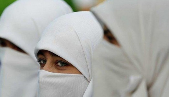 الصين تحظر النقاب واللحى في إقليم تركستان الشرقية