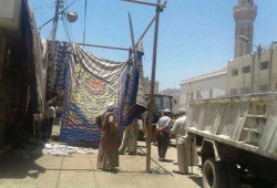 صور| إجرام العسكر يبدأ حملة لإزالة "موائد الرحمن" بالصعيد