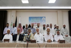 وقفة لعشرات العلماء بغزة تضامنا مع الشيخ القرضاوي