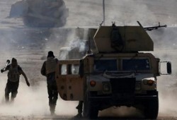 قوات عراقية تتقدم بكركوك والكرد يدمرون آليات للحشد