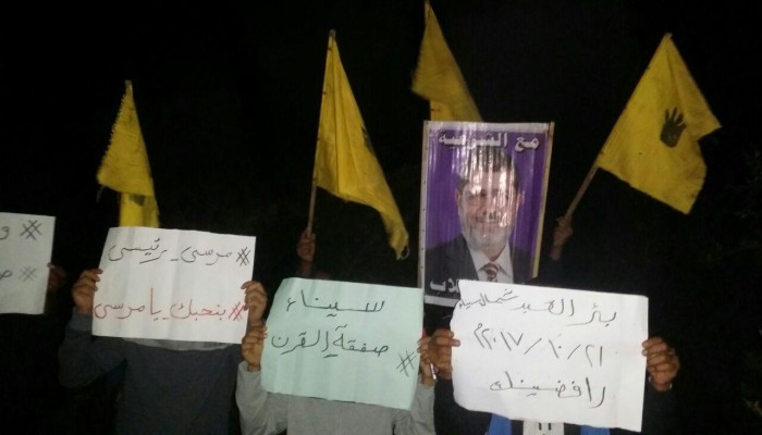 وقفة ليلية لثوار بئرالعبد بأسبوع "رافضينك"