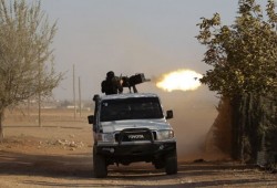 هجمات مزدوجة من النظام وتنظيم الدولة على تحرير الشام بحماة