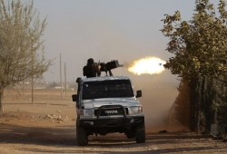 هجمات مزدوجة من النظام وتنظيم الدولة على تحرير الشام بحماة