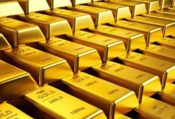 الذهب يلامس أقل مستوى له في 3 أسابيع عند 1264 دولارا