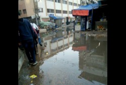 مياه الصرف الصحى تغرق شارع "موقف كفر الدوار"