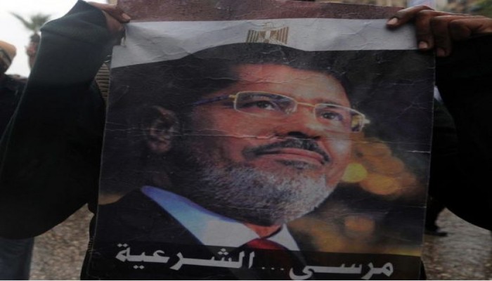 نجل الرئيس مرسي: محاولات قتل والدي تتم على قدم وساق