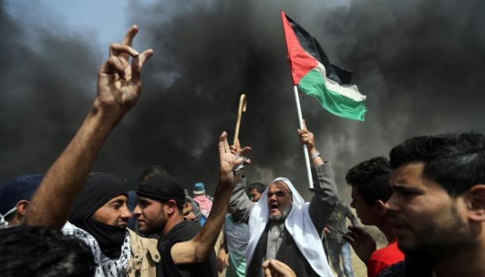 أعلام فلسطين تواجه الرصاص في مسيرات العودة