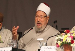 أمير قطر يقيم مأدبة إفطار للعلماء ويحتفي بالقرضاوي