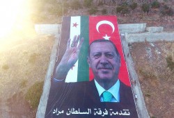 بمناسبة فوزه بالانتخابات.."الجيش الحر" يرفع صورة كبيرة لأردوغان بـ"عفرين"