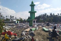 مقبرة جماعية لدفن ضحايا تسونامي إندونيسيا