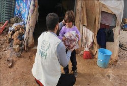 "الإغاثة التركية" توزع 3 أطنان من اللحوم على النازحين السوريين