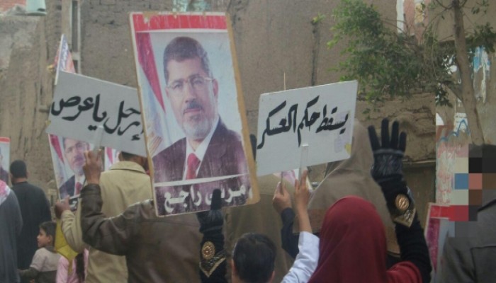 تظاهرة بقرية الرئيس تندد بإعدام 9 شباب بهزلية النائب العام