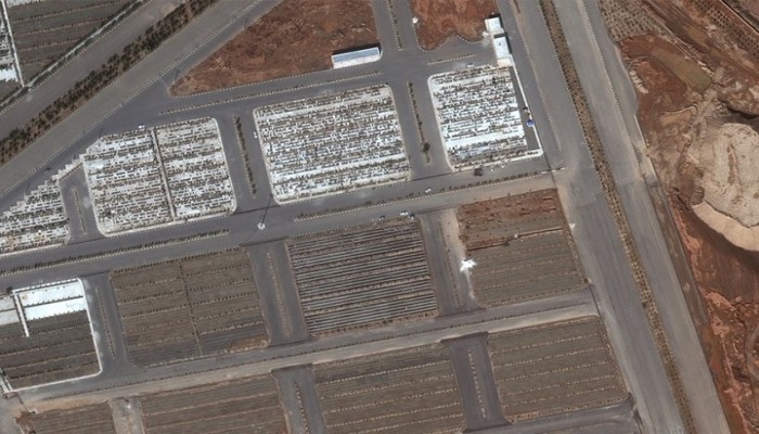 هل كورونا السبب.. صور فضائية لقبور جماعية في "قم" بإيران