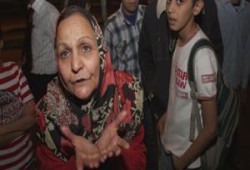ضابط يعتدى على سيدتين بشارع جامعة الدول