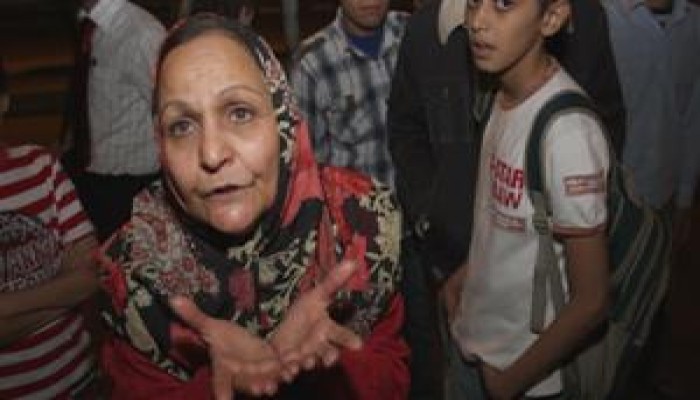 ضابط يعتدى على سيدتين بشارع جامعة الدول