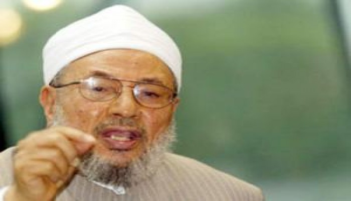 القرضاوي ينتقد دولنا  التي تنفق المليارات على شراء السلاح ولا يستخدم إلا لقمع المظاهرات