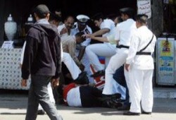 أحمد عز الداخلية ينزع نقاب زوجة احد إخوان المحلة ويسرق2700جنيه ويحاول نزع مصاغها