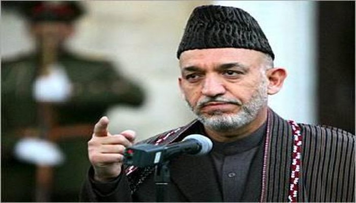 كرزاي يهدد بالانضمام لطالبان