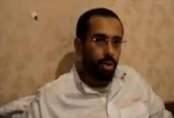 شاب يحكي كيف قتل ضباط الشرطة المتظاهرين بالرصاص الحي من الخلف كالأسرى(متلفز)