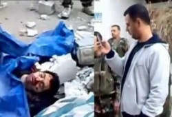 اللقطات الممنوعة : ماهر الاسد يصور أشلاء السوريين كتذكار (متلفز)