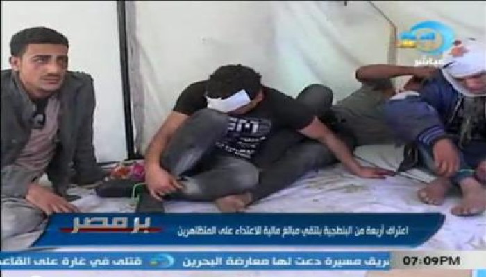 بلطجية العباسية يحملون كارنيهات الوطني المنحل (متلفز)