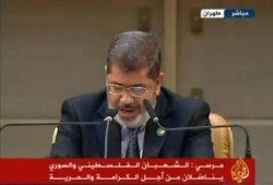مرسي بـ"عدم الانحياز": النظام السوري فقد شرعيته والتضامن مع الشعب واجب