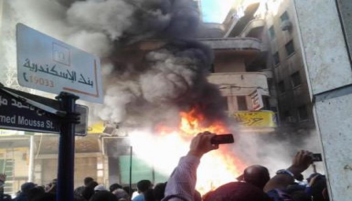 بلطجية التيار الشعبي والدستور يحرقون مقر حزب الحرية والعدالة بالاسكندرية (صور)