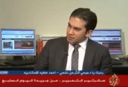 مذيع الجزيرة يلقن مدير تحرير اليوم السابع درسا في المهنية! (متلفز)