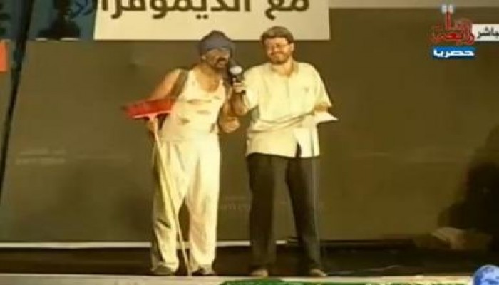 عطوه كنانه يركب السيسي علي منصة رابعة العدوية ساخر جداً  (متلفز)