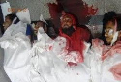 وقفة احتجاجية لأهالي الشهداء والمصابين والمعتقلين أمام مجمع محاكم الفيوم