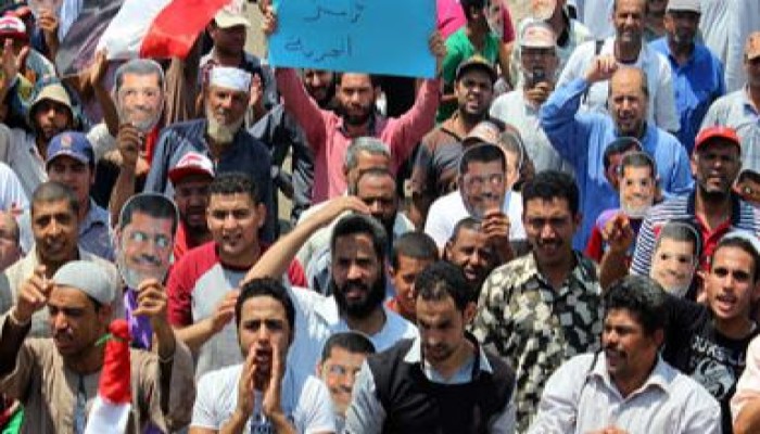 العسكر يرتعد من مسيرة مؤيدي الشرعية بالدقي ويفلق الشوارع