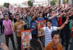 بالصور أولتراس نهضاوي يشعل الهتافات في تظاهرات تأييد الشرعية بطنطا بالغربية