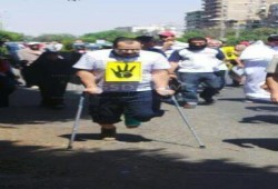 مصاب برصاصتين في القدم بمجزرة النصب التذكاري ويشارك في مسيرة مصر الجديده